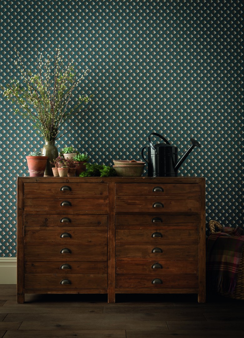 Function and style in a rural home chest and wallpaper