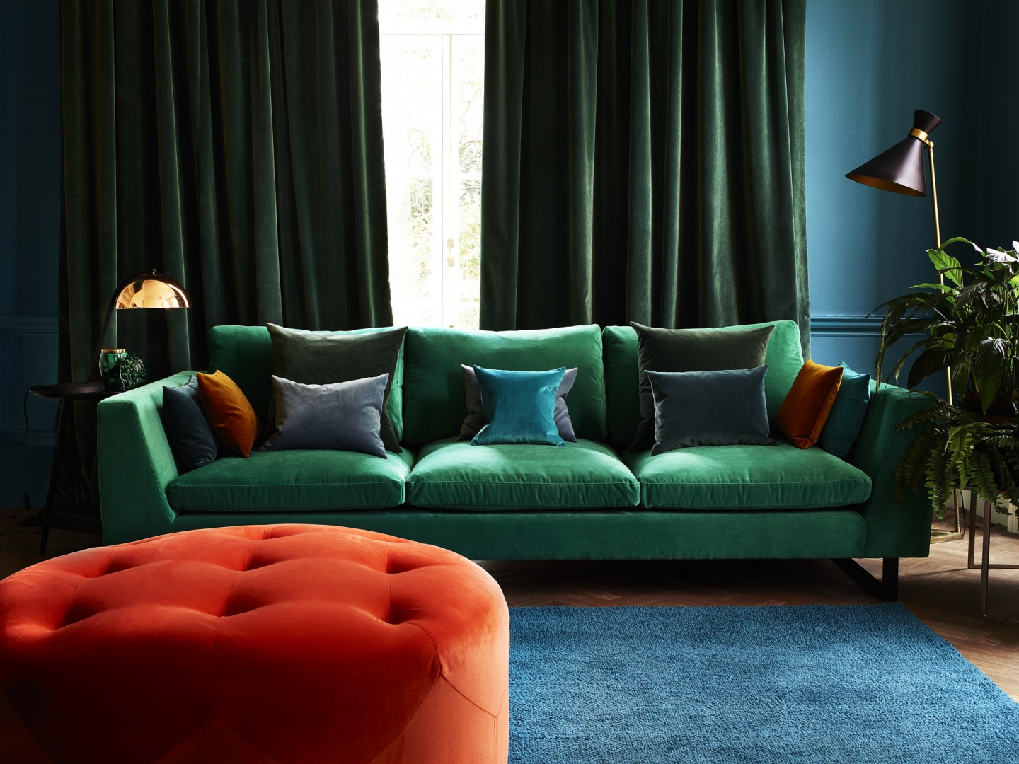 Bespoke Upholstery making a statement Emerald and Teal sofa