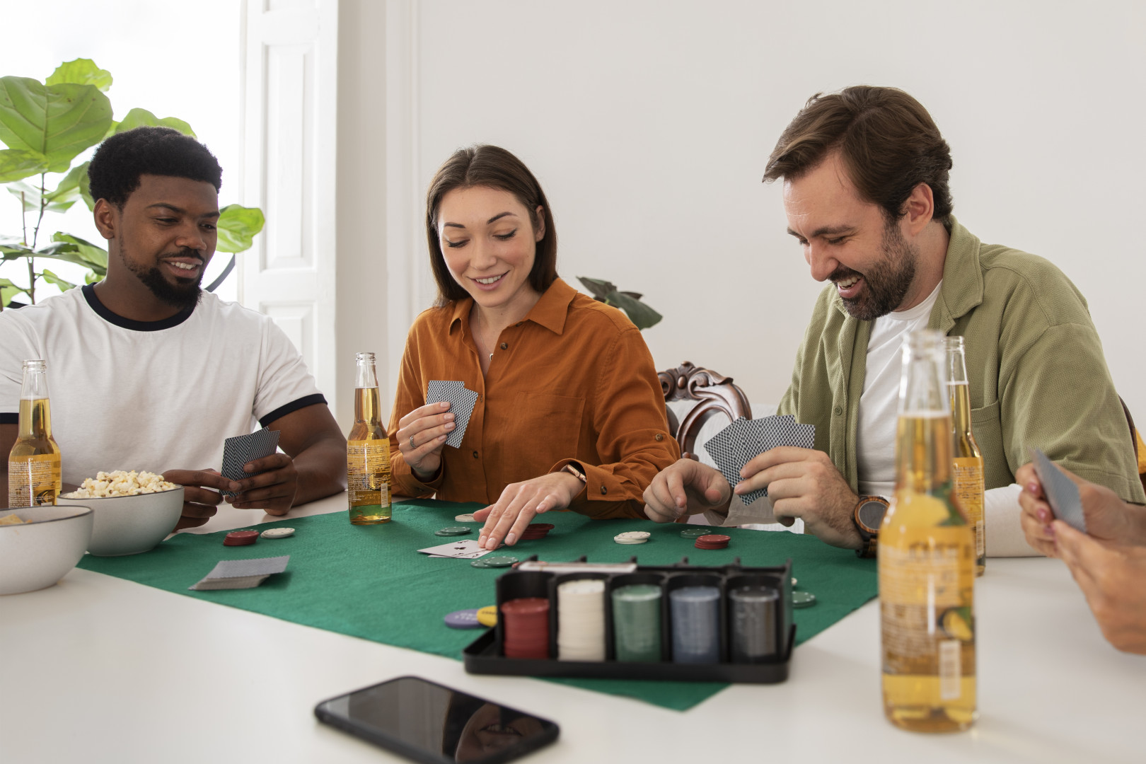 friends playing poker together